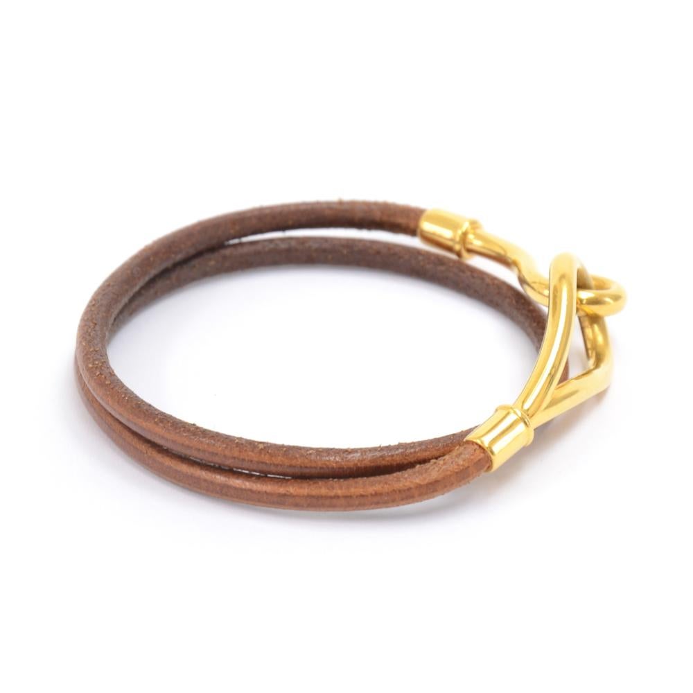 Hermes long leather Jumbo bracelet. Hermes is engraved on the hook.  Can be wrapped around your wrist twice for the layered or stacked look. A simple and elegant design. SKU: HA941
Total wearable length: approx  14.6 in or  37 cm

Made in: