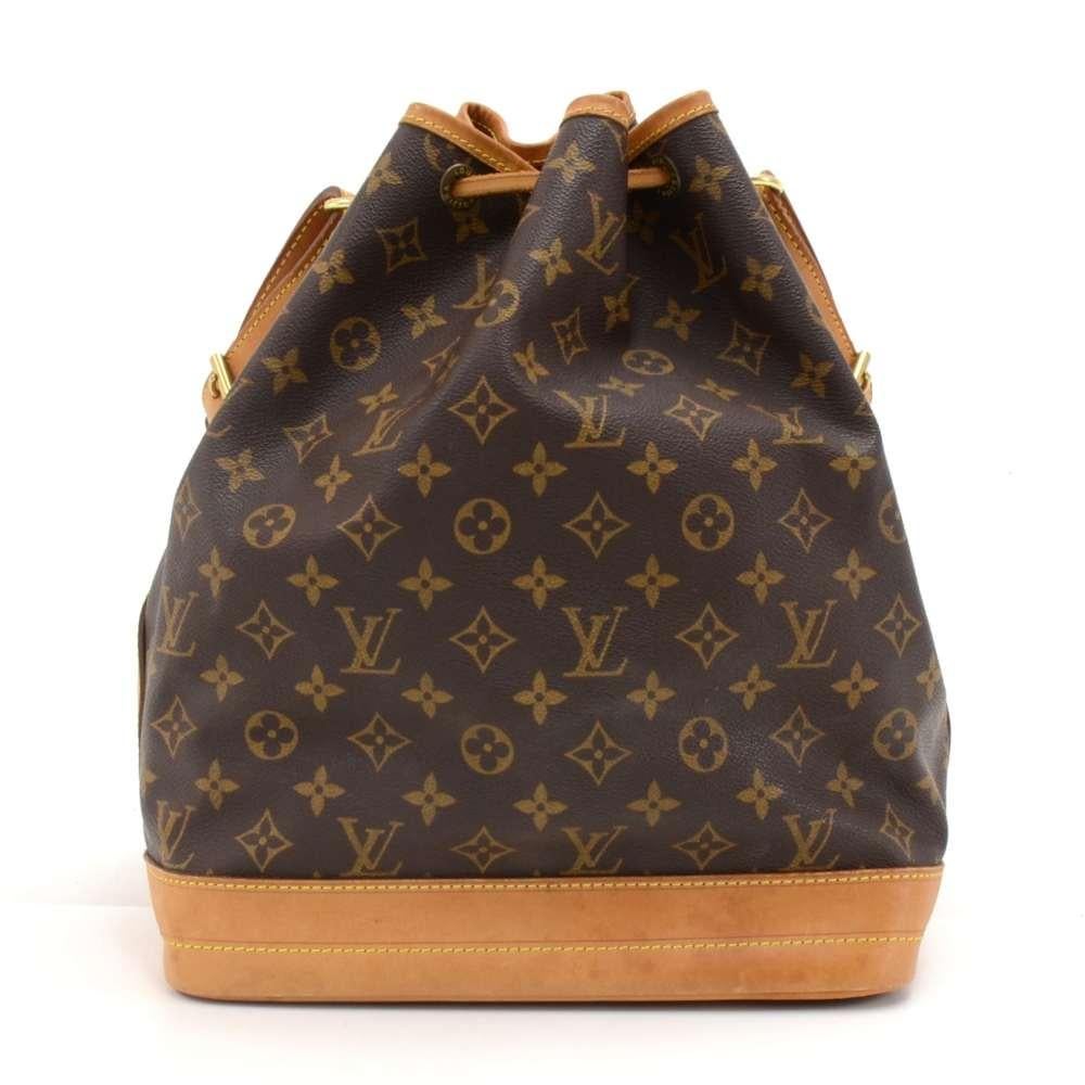 Vintage Louis Vuitton Noe shoulder bag. It has adjustable shoulder strap and tie up string closure. Inside is brown lining. The famous champagne bag created in 1932 which makes it a true classic. SKU: LQ529

Made in: France
Serial Number: