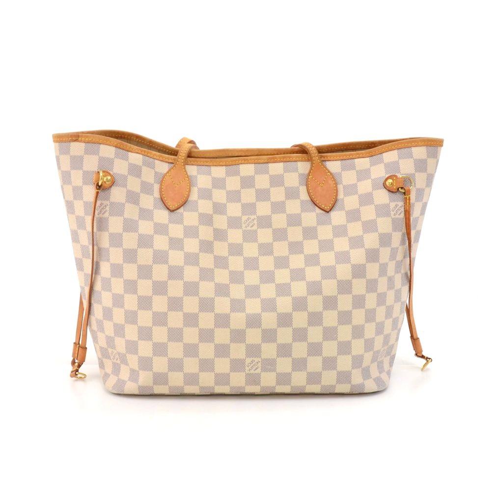 Louis Vuitton Neverfull MM tote bag in white Damier Azur canvas. Open access. Inside has 1 zipper pocket. Comes with D ring inside to attach small pouches or keys.  Can be carried on the shoulder with the leather straps. Great versatile and classic