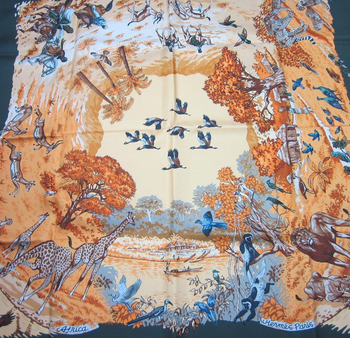 Birds, monkeys and other wildlife depicted in this Silk Hermes scarf 

Measuring 34 x 34
1997 Robert Dallet 

Any questions please call or hit 