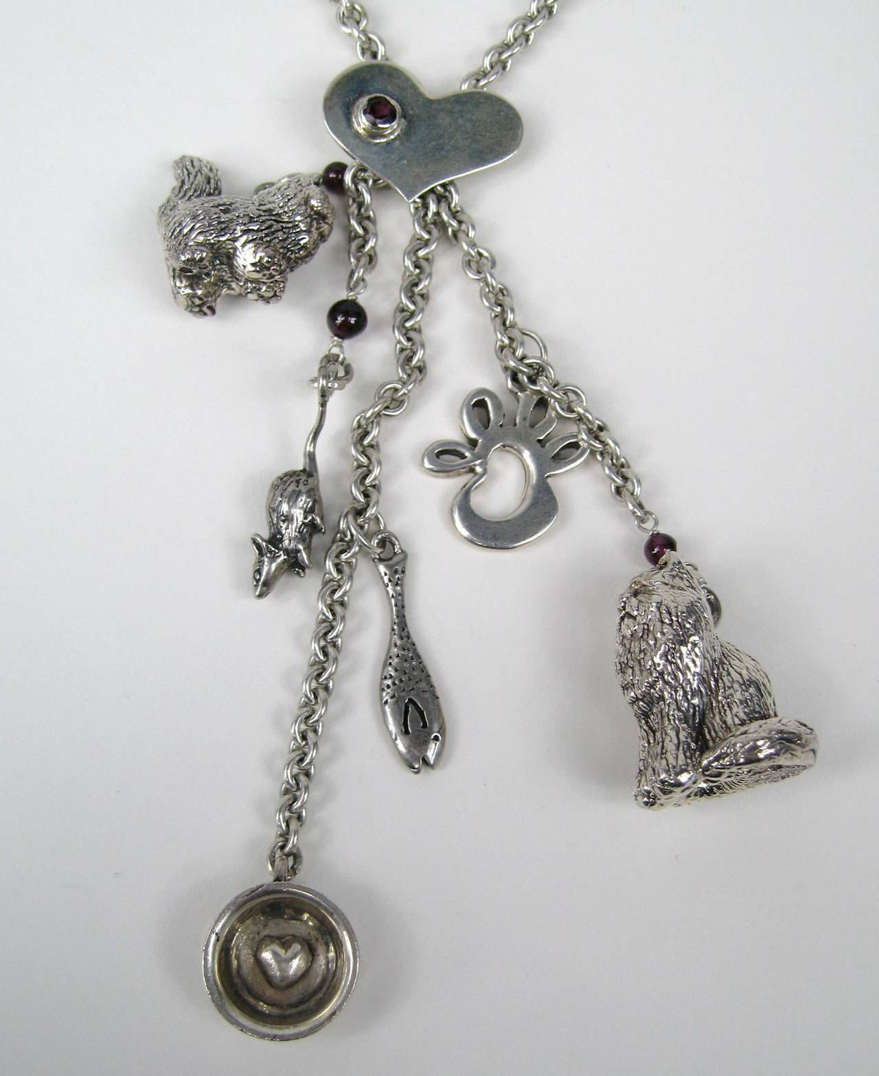 This is adorable
Charms- 2 Large cats, a fish, a mouse, a food dish, Paw, and a 