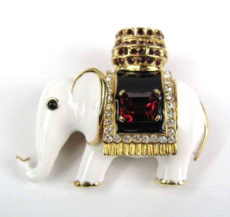 Ciner Elephant Brooch
Stunning Deep Red Swarovski Crystal set in a White Enamel Body, along with clear crystal
This measures 1.98