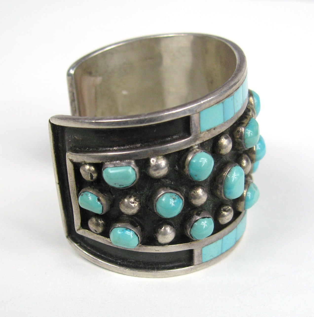 Sterling  Silver Old Pawn Bracelet 
Turquoise Bracelet
Signed  by  Jobeth Mayes
Stork Hallmark
Mayes  Maize  right  of  Stork

22 Turquoise Nuggets
Each  framed  in  Individual Bezels
18  Hand  Cut  and  Polished Turquoise  Inlay

Will fit