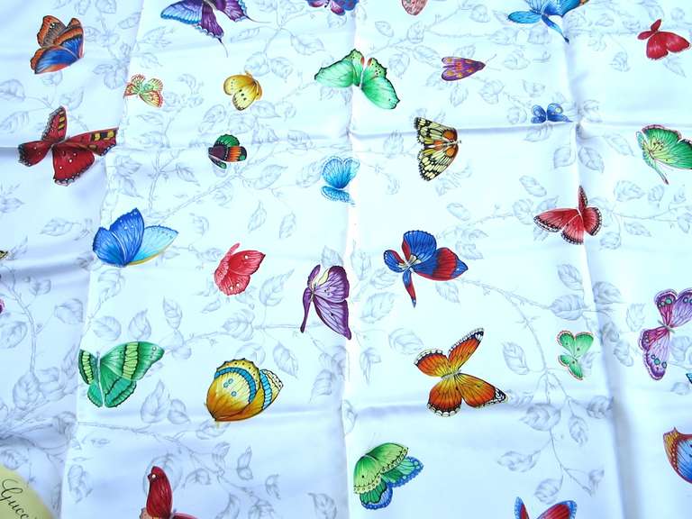 Description: Here is another lovely silk scarf which as with the rest of the Gucci's are New Old Stock
Purchased and stored away since the late 80s early 90s 

Wonderful Butterfly motif, coloring is spectacular! 

Any questions hit contact
