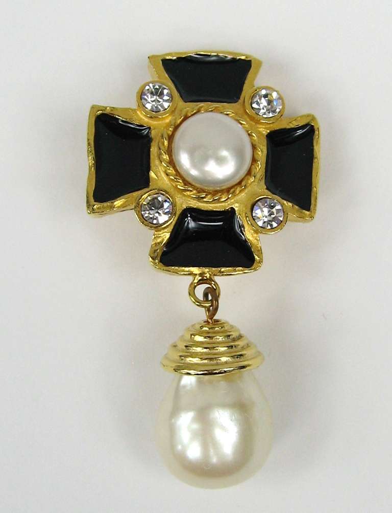 Maltese Cross Gerard Yosca 1980s
Gilt Gold Earrings
Black Enamel
Faux Pearls
Crystals
Measuring 
2.38