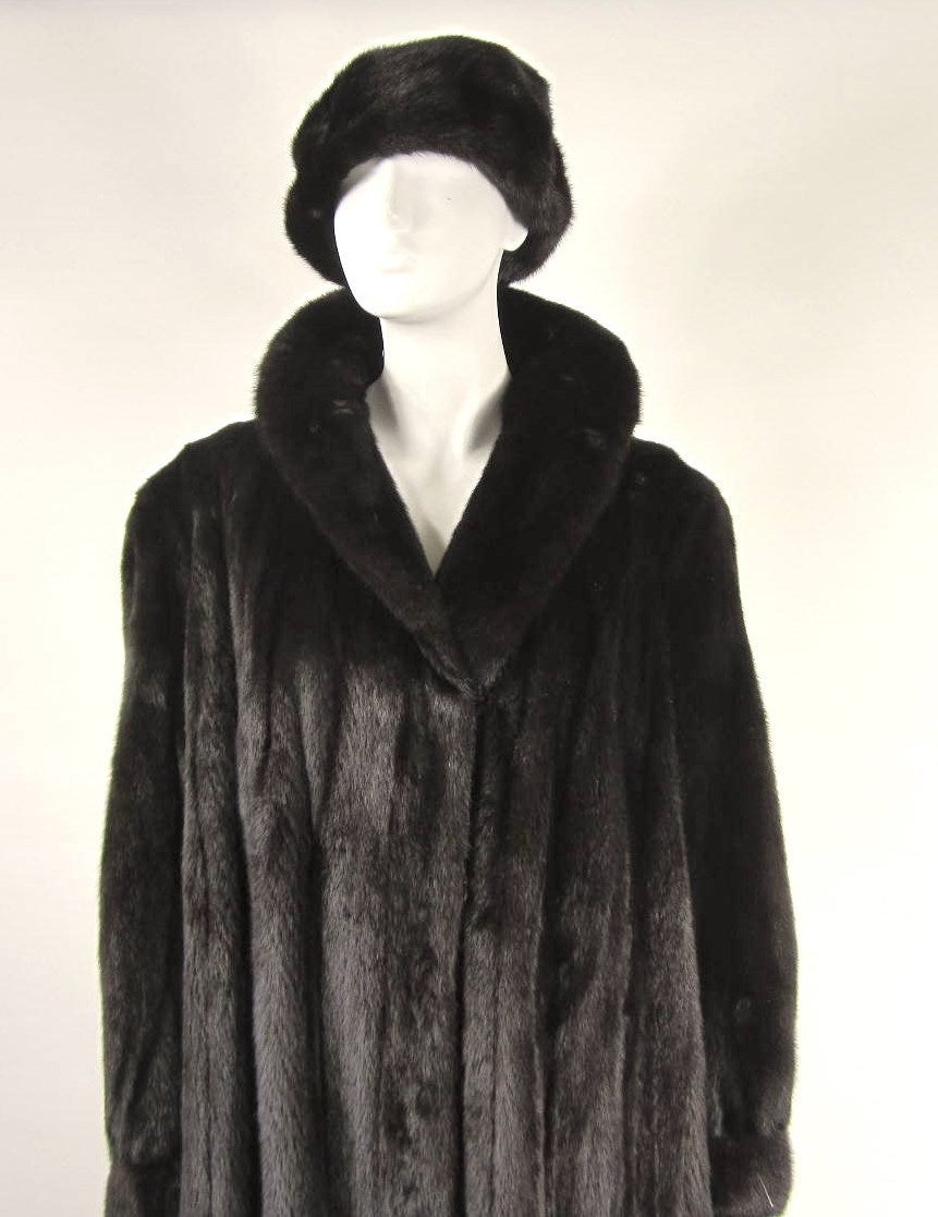Stunning Ranch Mink coat made by furrier George Zessi

Comes with matching beret Hat
Now this is an AMAZING COAT.
Supple & Soft and well as being taken care of
 this Large and Long MINK FUR COAT
Timeless cut that can be worn for years to come,