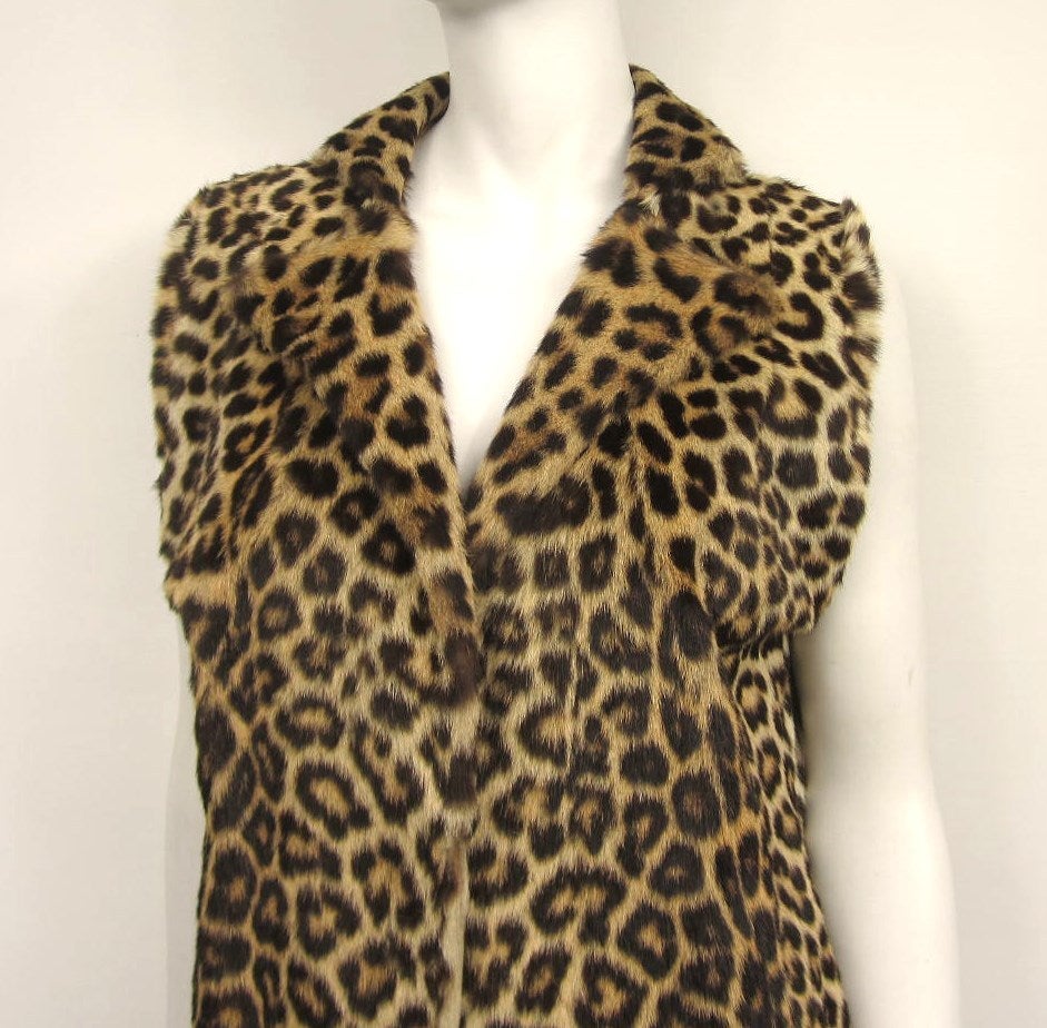 Stunning piece of fur that you can no longer get and with animal prints all over the catwalk again, this will be a staple in your attire

    Eye popping Leopard print
    Newly Lined
    Fur is soft and supple
    Slit side pockets
    Circa