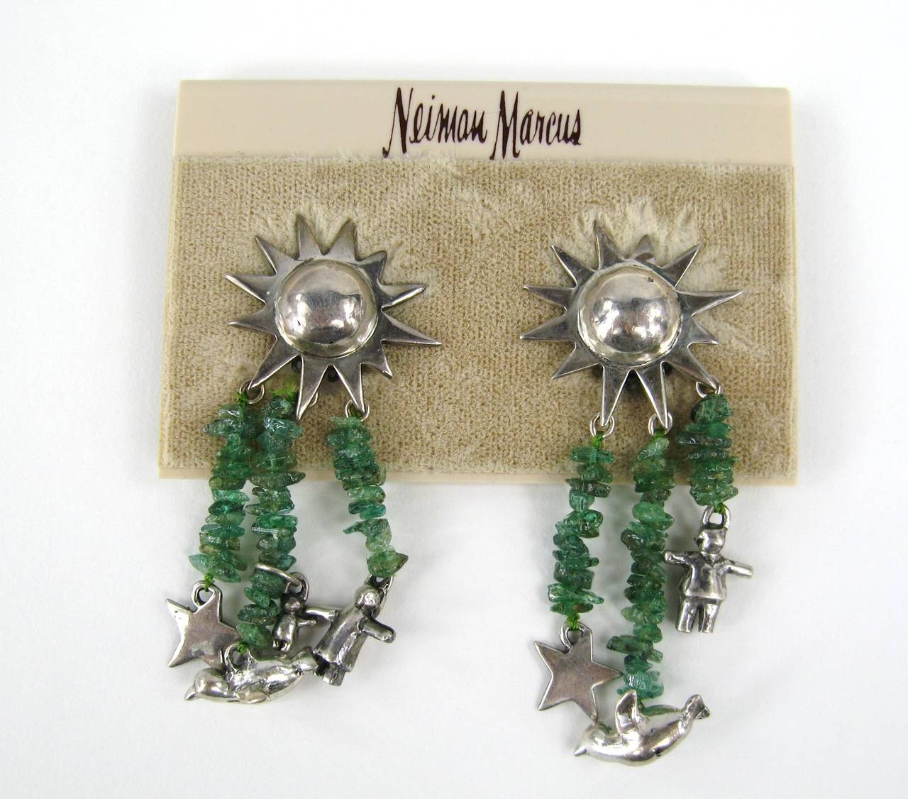 Still on the original Neiman Marcus earring Card
3 green stone with hanging charms 
Sun in sterling for your ear 
Measuring 
2.62