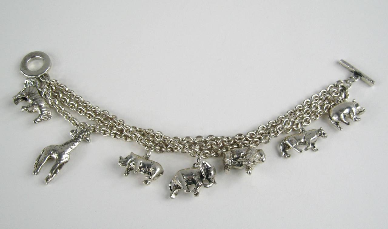 3 strand Felley Charm bracelet 
Sterling Silver
Hippo, lion, Gorilla, Elephant, Rhino, Giraffe and Zebra 
Measuring 
7.5