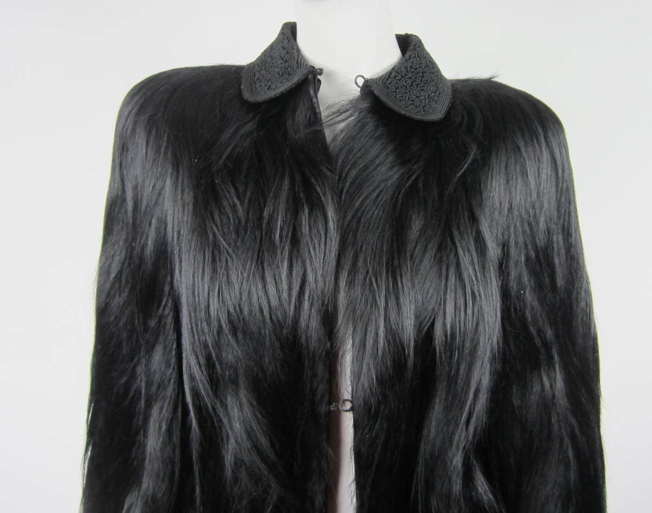 Fabulous Monkey Coat 
Wonderful piece to wear over a stunning dress or a pair of jeans. Circa 1940s cut. Long shiny Monkey fur which is all the rage. Soft supple pelts 
Red Carpet Ready.
cordé Peter pan collar
Extremely rare find and in great