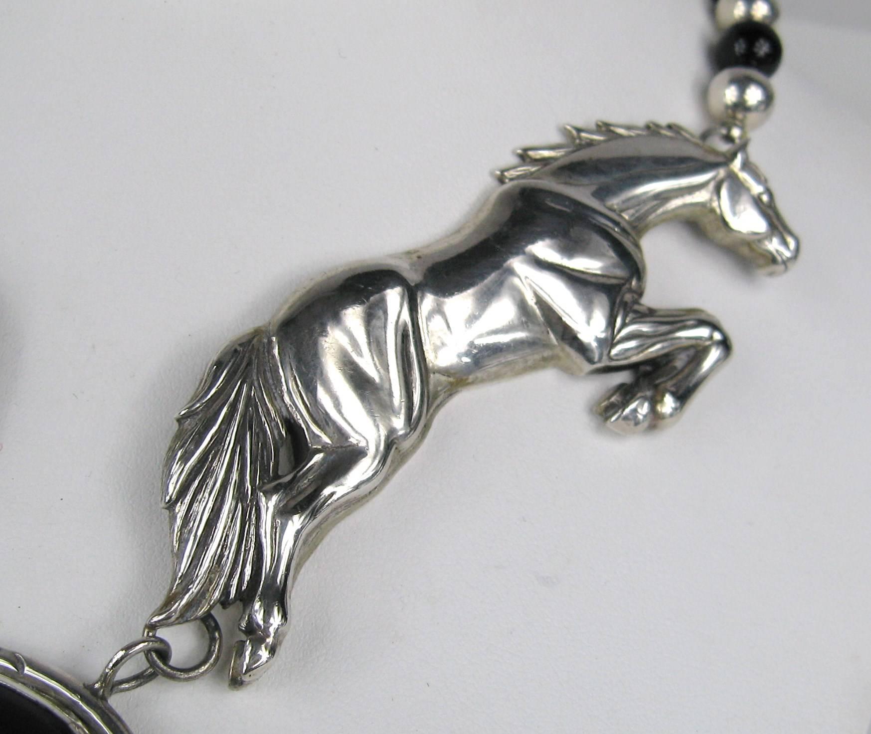 1990s Sterling Silver CAROL FELLEY Onyx Horse Duo Necklace In Excellent Condition In Wallkill, NY
