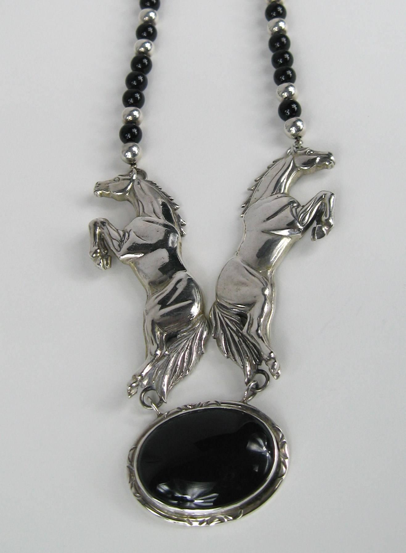 Stunning Carol Felley Horse Necklace 
Circa 1990s 
Large Black Onyx Center 
Onyx and sterling beading 
Measuring 
Wearable Length: 24