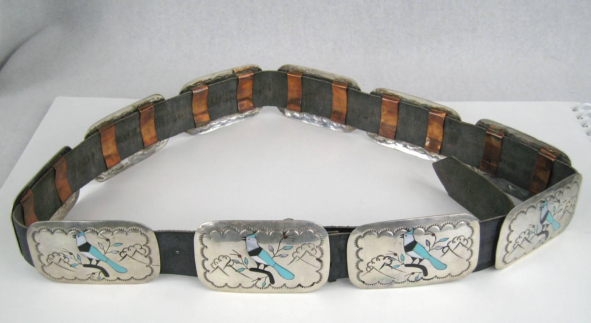 Another Fantastic Belt from our collection of Navajo, Zuni and Hopi Jewelry 
Paneled Sterling silver Concho Belt with inlaid Blue Jays
Hallmarked BB on the back side 
 
measures 44