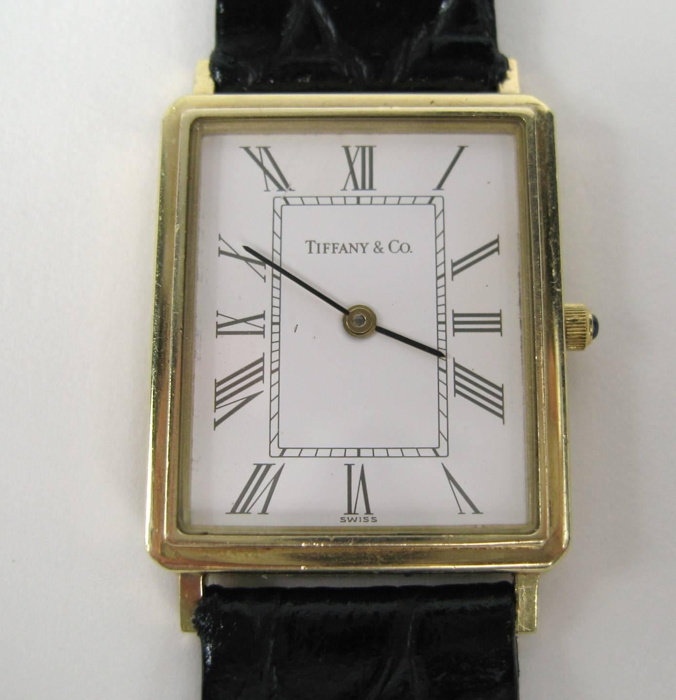 Sleek 14K Gold Tiffany Gold Watch
Measuring 35.37mm or  1.39