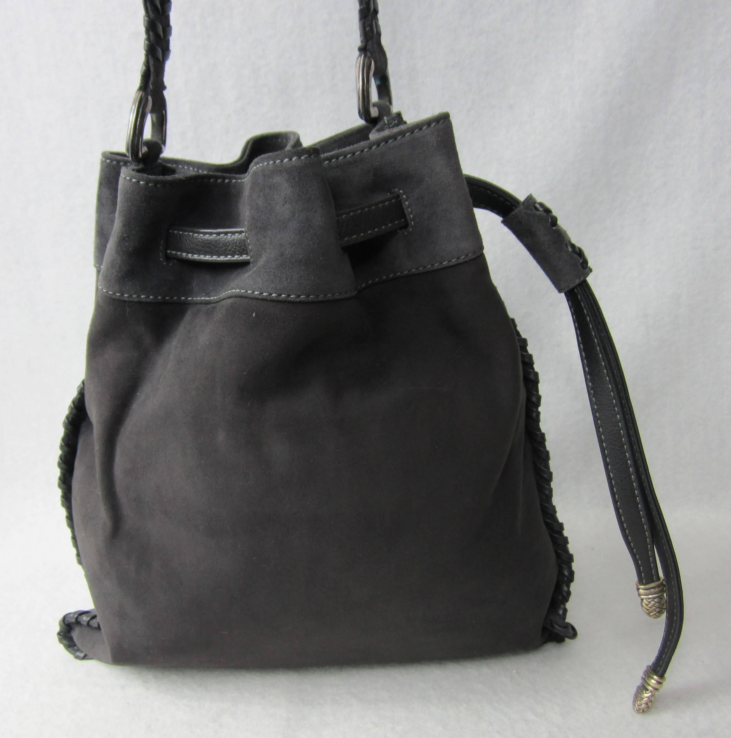 Barry Kieselstein Cord Steel Gray Suede Leather Handbag Purse

Beautiful Kieselstein Cord tote that was purchased at Bergdorf Goodman back in the 1990s then stored away

Stunning Deep Dark Steel Gray color, with Sterling Silver Hardware and a