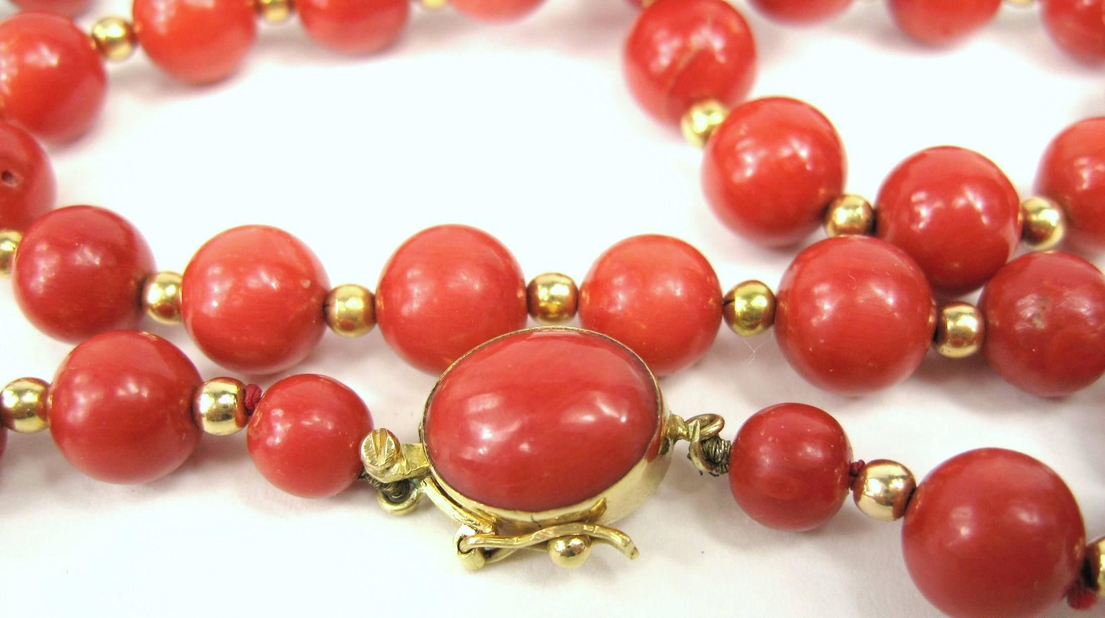 Antique Red coral bead 18k Gold necklace. 
1 strand of red coral beads, linked by 18k gold beads in between coral beads,in between each bead.
 magnificent red coral beading on this necklace
Beads measure from 9.90mm x 12mm
Slide in clasp with