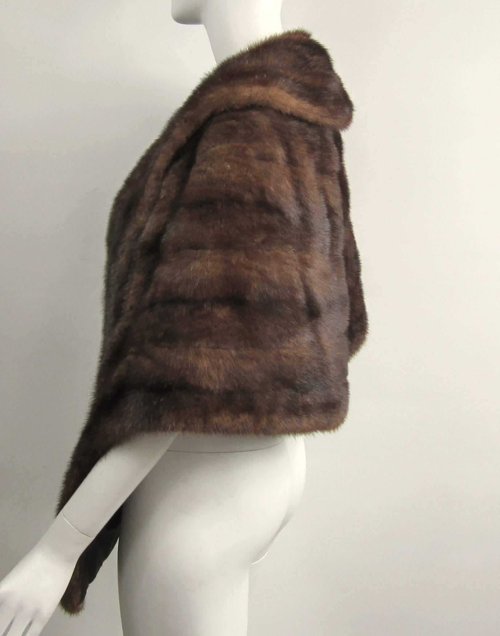 Stunning vintage Mink Shrug 
2 slit pockets / lining does have monogram 
Soft Supple mink 
Will fit a 10-16 
Measuring Approximation
29