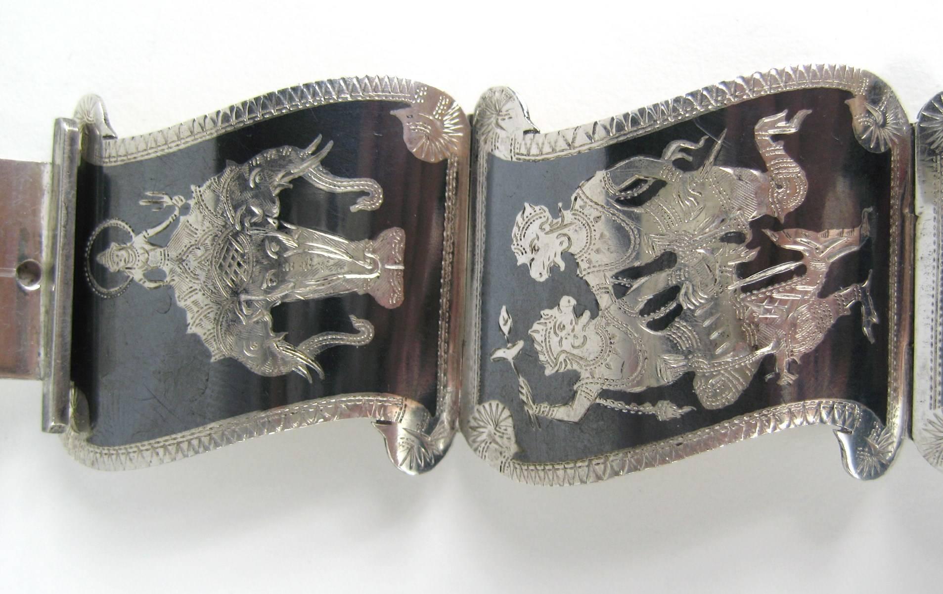 Stunning 5 panels sterling silver bracelet 
Slide in closure, hallmarked sterling silver 
1.25 in wide 
Will fit up to a 7.5 inch wrist 
Any questions please call or hit contact 