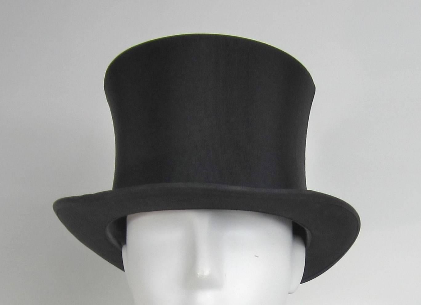 Out of an estate of a man who collected hats for years. This one appears to be unworn and is in a early Dunlap Hat Box. It measures 7-3/4 and is 5.5 inches tall - with a 2-7/8 in Brim. 
Any questions please call, email or hit contact 