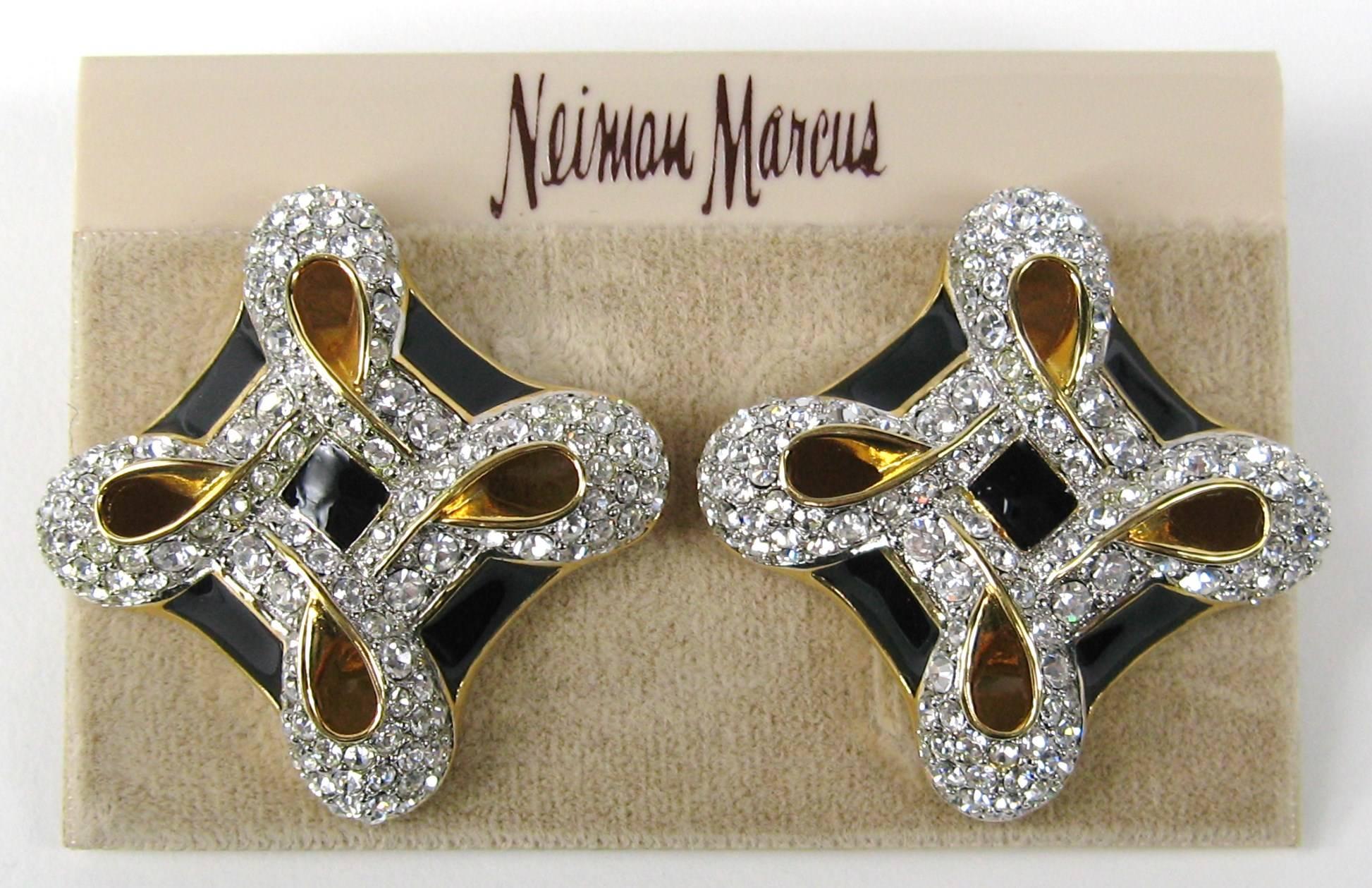 Stunning Swarovski Earrings. Still on original  Neiman Marcus earring card. Measuring 1.50 in x 1.50 in. Visit our store front for hundreds of designer costume jewelry as well as sterling silver. Be sure to follow us to get email updates of our new