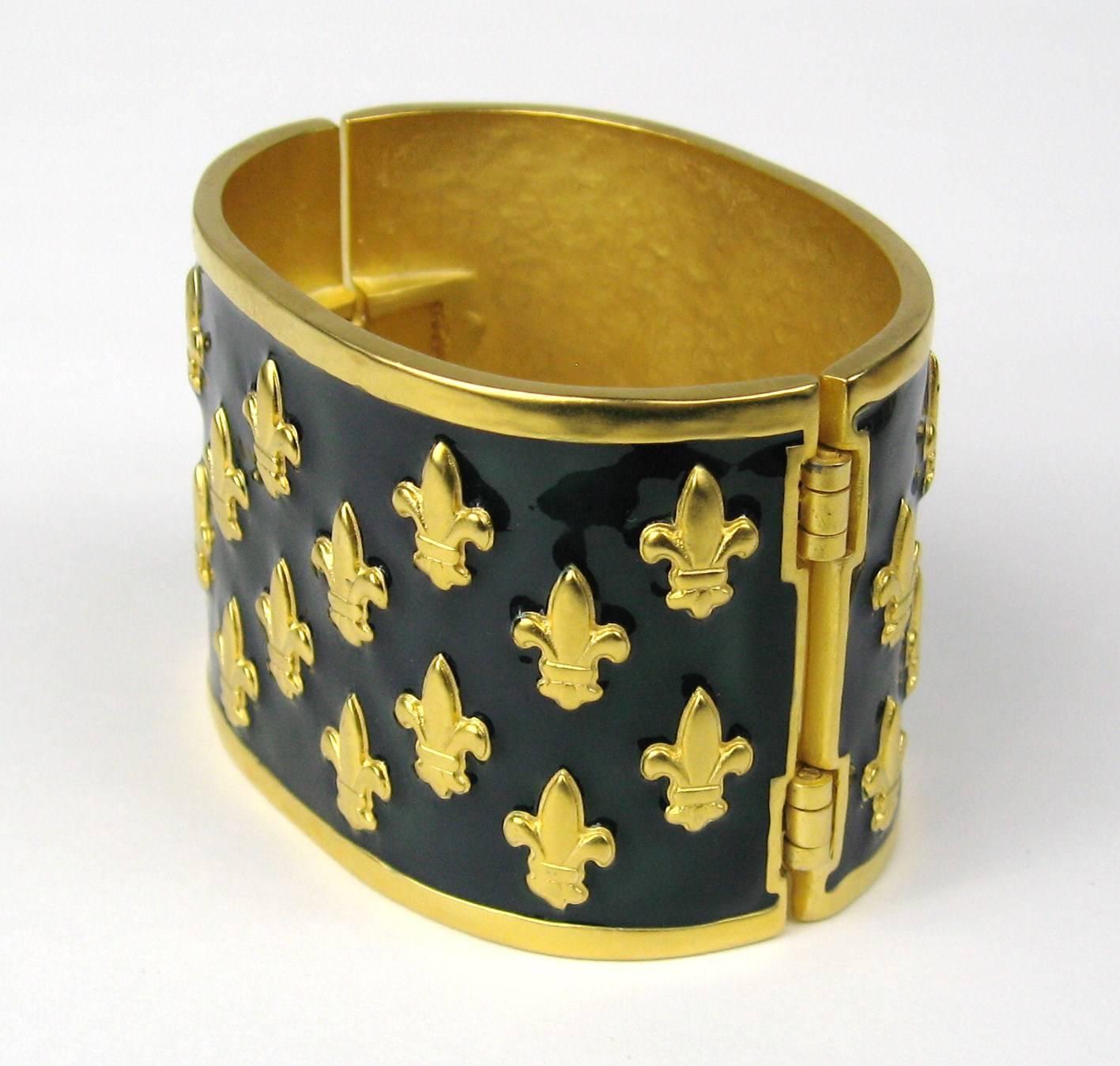 A stunning large Karl Lagerfeld fleur de lis Enamel bracelet. Measuring 1.91 IN wide. Be sure to follow us to get email updates of our new additions every week. This is out of a massive collection that includes hundreds of pieces of jewelry that