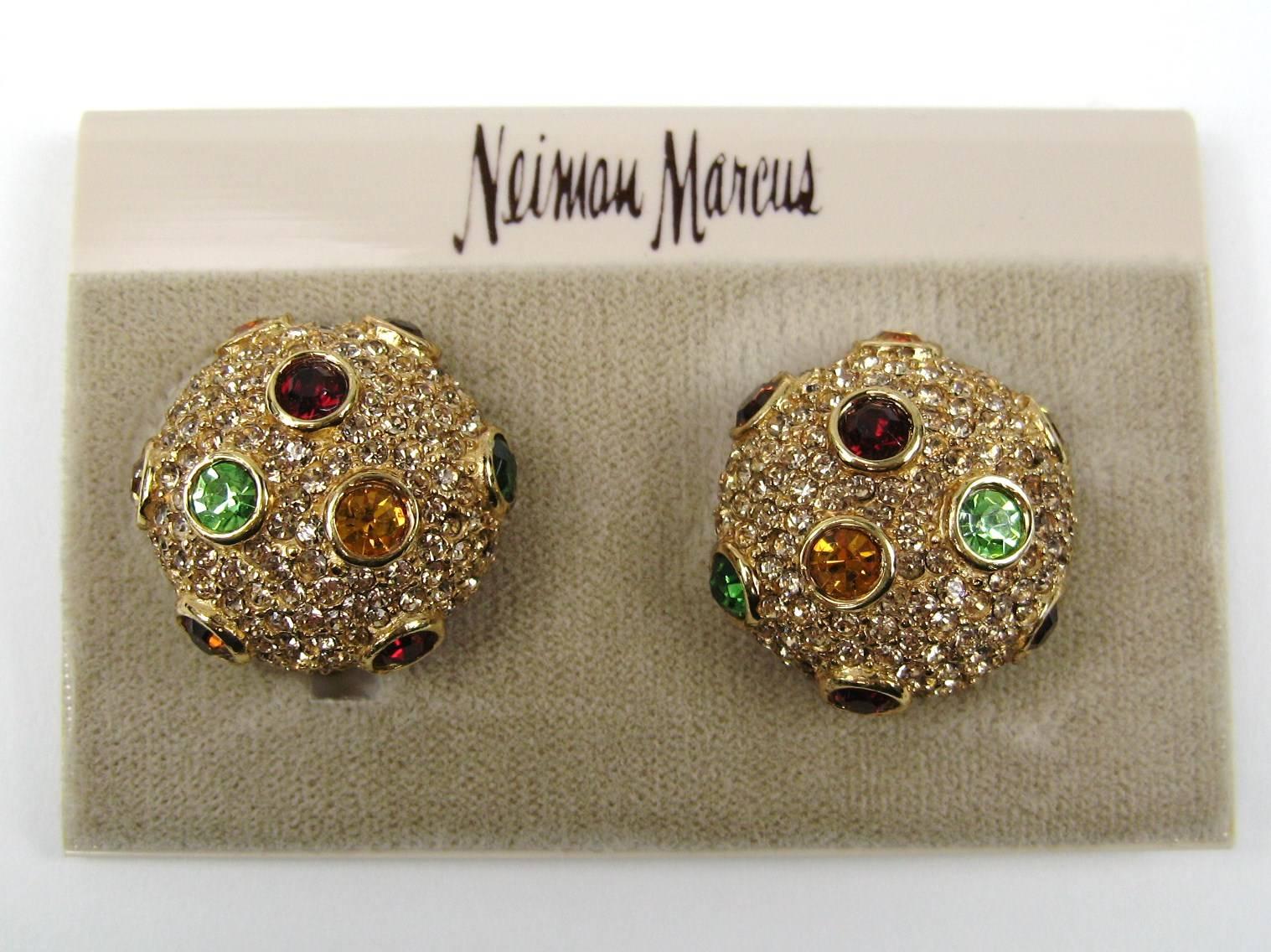 Red, Green, Amber and clear Swarovski crystal Earrings. Still on original earring card. Measures .92 inches in diameter. Visit our store front for hundreds of designer costume jewelry as well as sterling silver. Be sure to follow us to get email