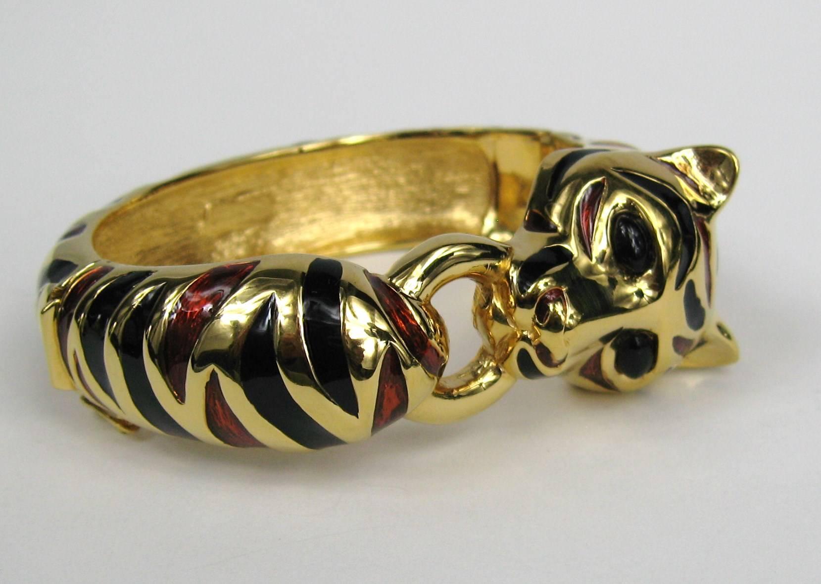 Another Fantastic Ciner Bracelet. Bracelet is enameled over Gilt Gold, hinged closure. Neiman Marcus and Ciner tags still attached. Never worn. Measures 2.5 in top to bottom x 3 inches wide Will fit a 6-7 inch wrist. Visit our storefront for