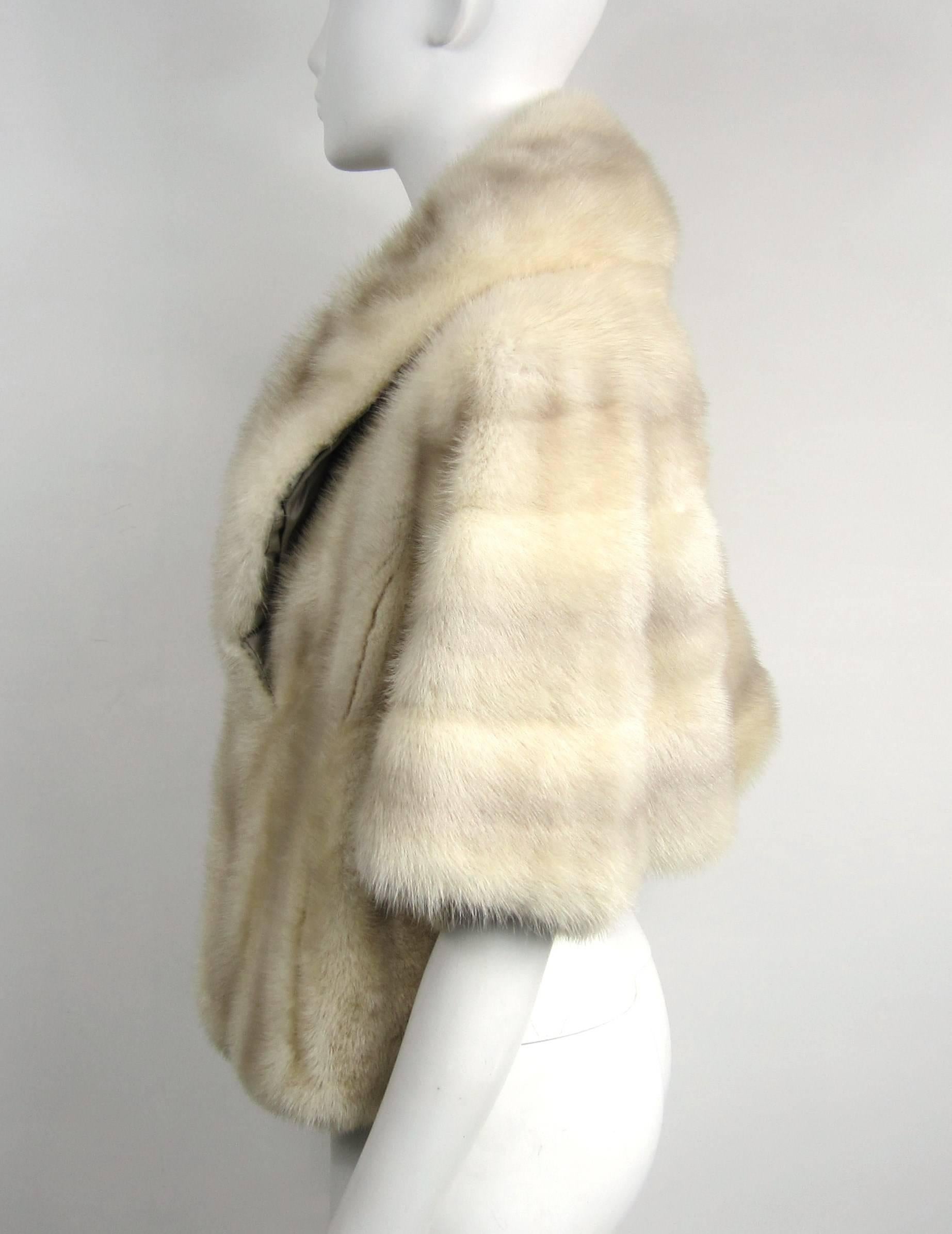 Soft and supple Mink wrap. Old Hollywood on this fabulous Shrug - It has attached armholes (Photographed) and take a look at the pinched Collar on it. Will fit a 2-6 nicely - Measuring 28 inches across laying flat armhole to armhole, 16.5 inches