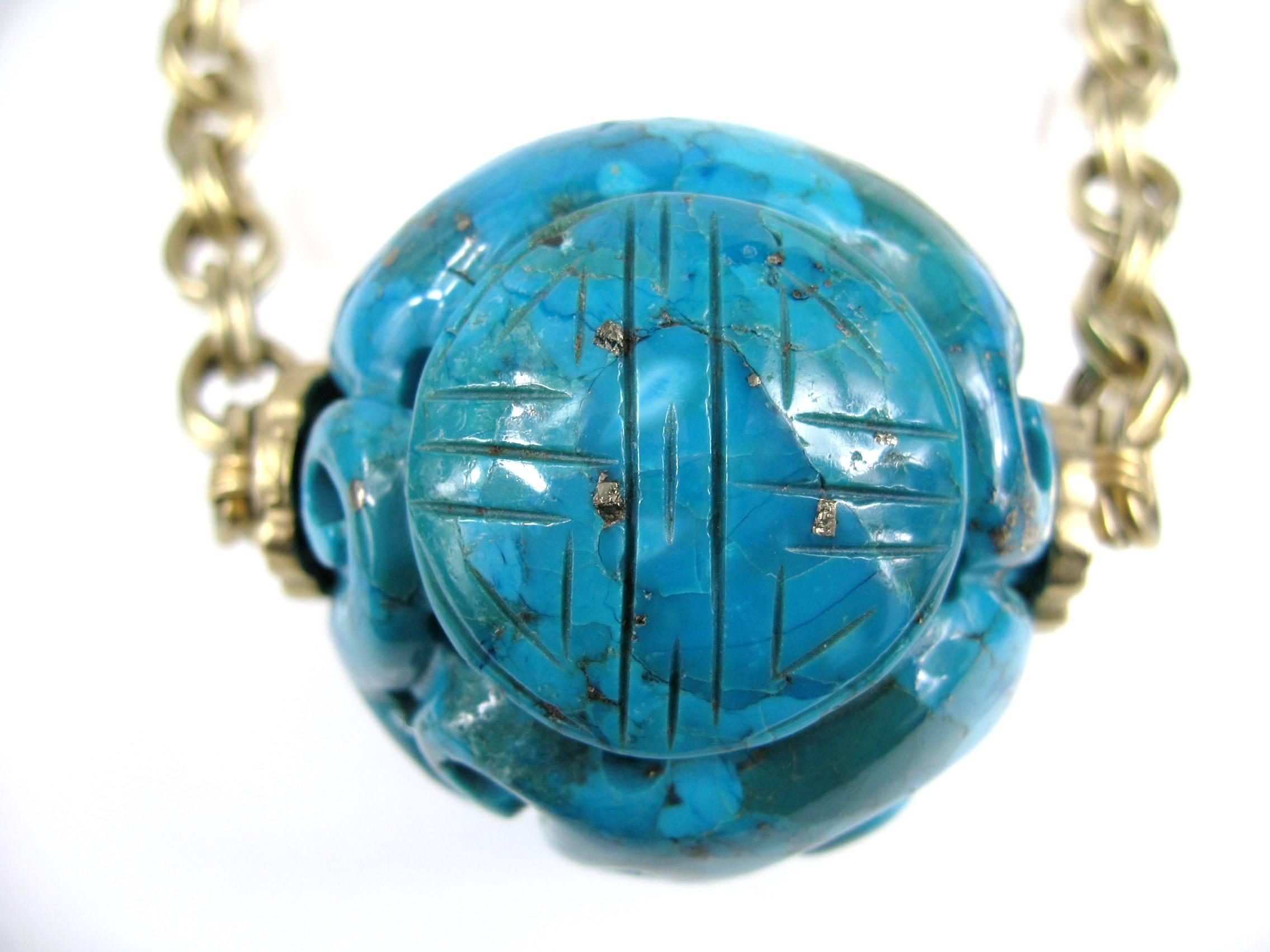 This is an incredible piece from the 1990's by Stephen Dweck. Stunning carved Turquoise Ball attached to a large gold washed sterling silver chain. The ball measures 52.59 mm or 2.07 inches. The chain is approximately 36 inches long, Turquoise Ball