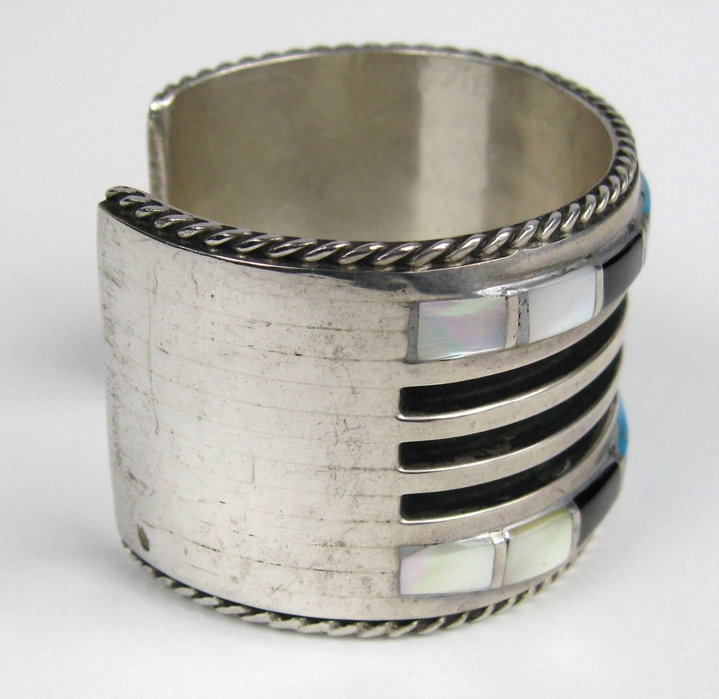 Heavy Sterling Silver Bracelet Nice statement piece Measuring 1.50 wide Opening is 1.20  Will fit a 6.5  to 7.5  wrist It does have some give to it. This is out of a massive collection of Hopi, Zuni, Navajo, Southwestern and sterling silver jewelry