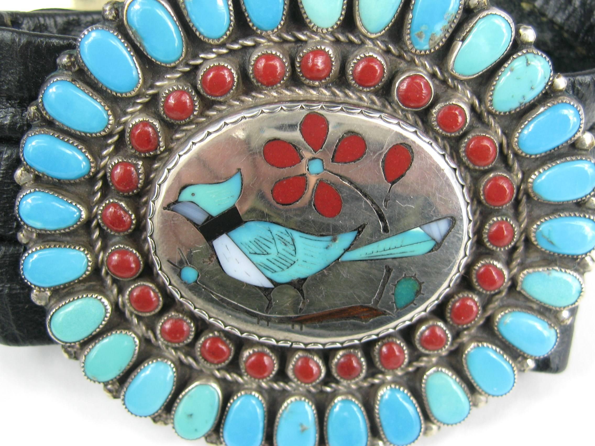 Sterling Silver concho bracelet.  L .H. Lonjose ZUNI  mother of pearl With coral, onyx, bone and turquoise by one of the renowned Lonjose family of Zuni Pueblo, N.M. Measures  Wide.2.58 x 2.86 . This is on a hand made leather strap with buckle on