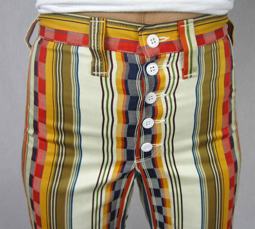 High waisted Striped and blocks colorful Pants. New, Never worn Wranglers. Button Fly front Stored away in a shop since it closed in the 1970s. Label size is 9/10 however this is a vintage sizing they fit like a modern 2-4 please refer to