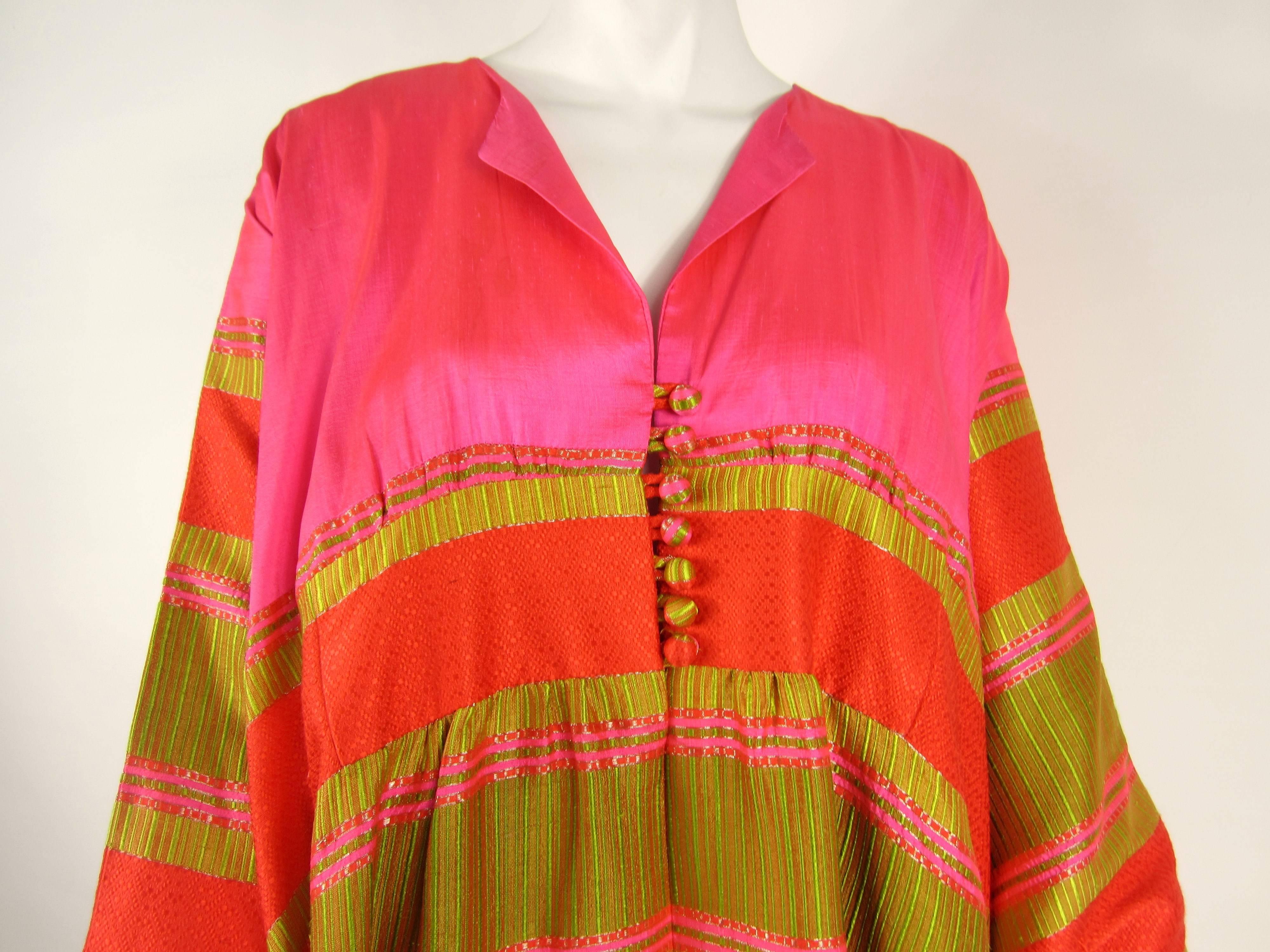 Stunning Silk Dupioni Caftan. LOOK AT THESE COLORS!!! One size fits all. Purchased at Bergdorf Goodman. The colors are this are amazing! It is 58 inches of Lux Silk. We have been selling this collection on 1st dibs since 2013. You can Follow us via