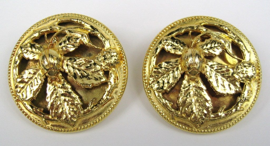 Gold Plated phillipe Ferrandis Floral Button earrings. Tiny Ladybug motif. Clip on's. 1.69 inches diameter. New Old Stock, never worn. This is out of a massive collection of Contemporary designer clothing as well as Hopi, Zuni, Navajo, Southwestern,