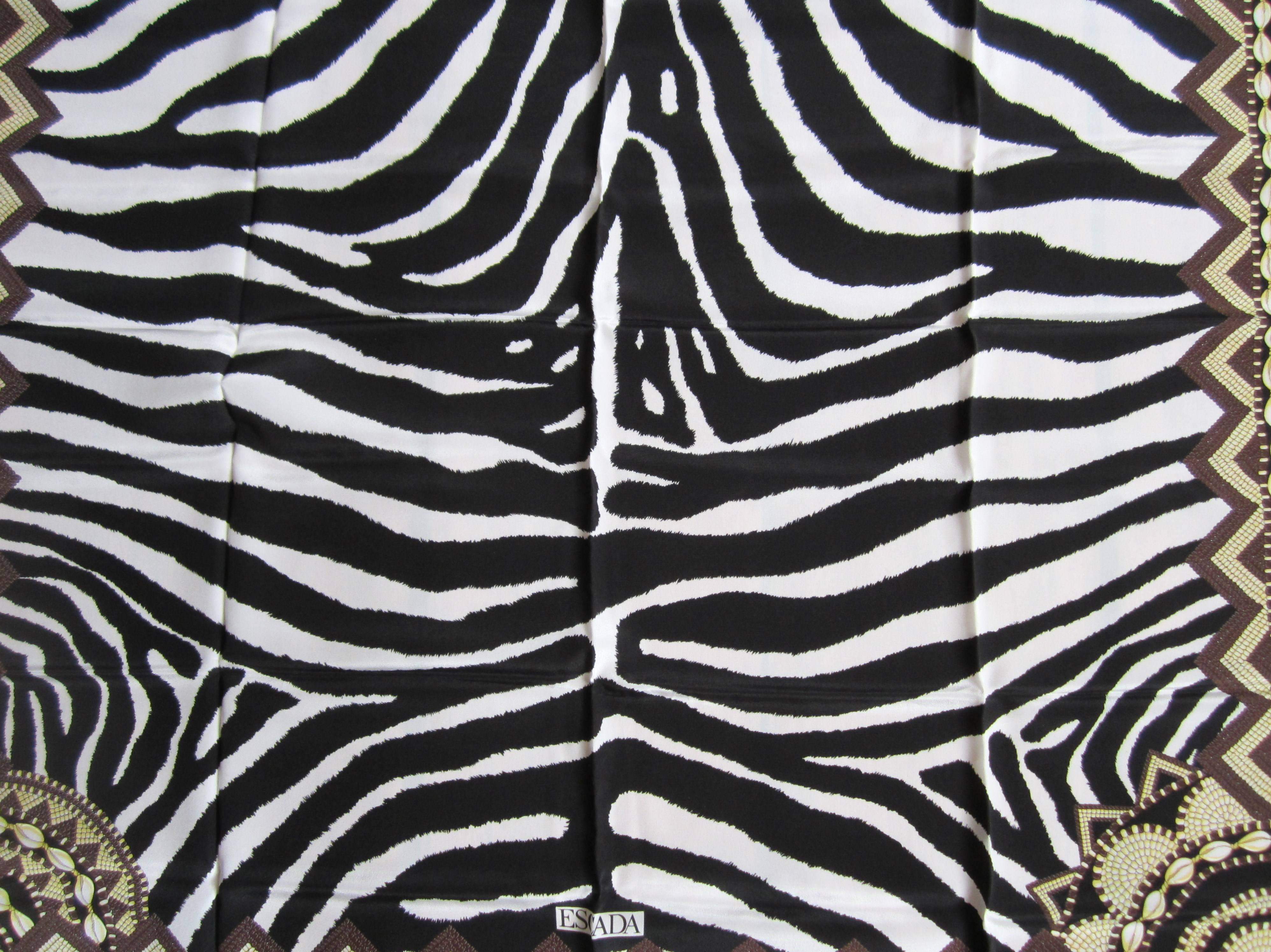 Silk Zebra Escada Scarf. Made in Italy. This was purchased in the late 80s or early 90s and stored away, never worn. From Neiman Marcus. Measuring 34 x 34 inches. This is out of a massive collection of Hopi, Zuni, Navajo, Southwestern, sterling