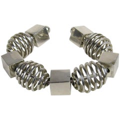 Manchette cubique moderniste en argent sterling avec cubes en forme de spirale