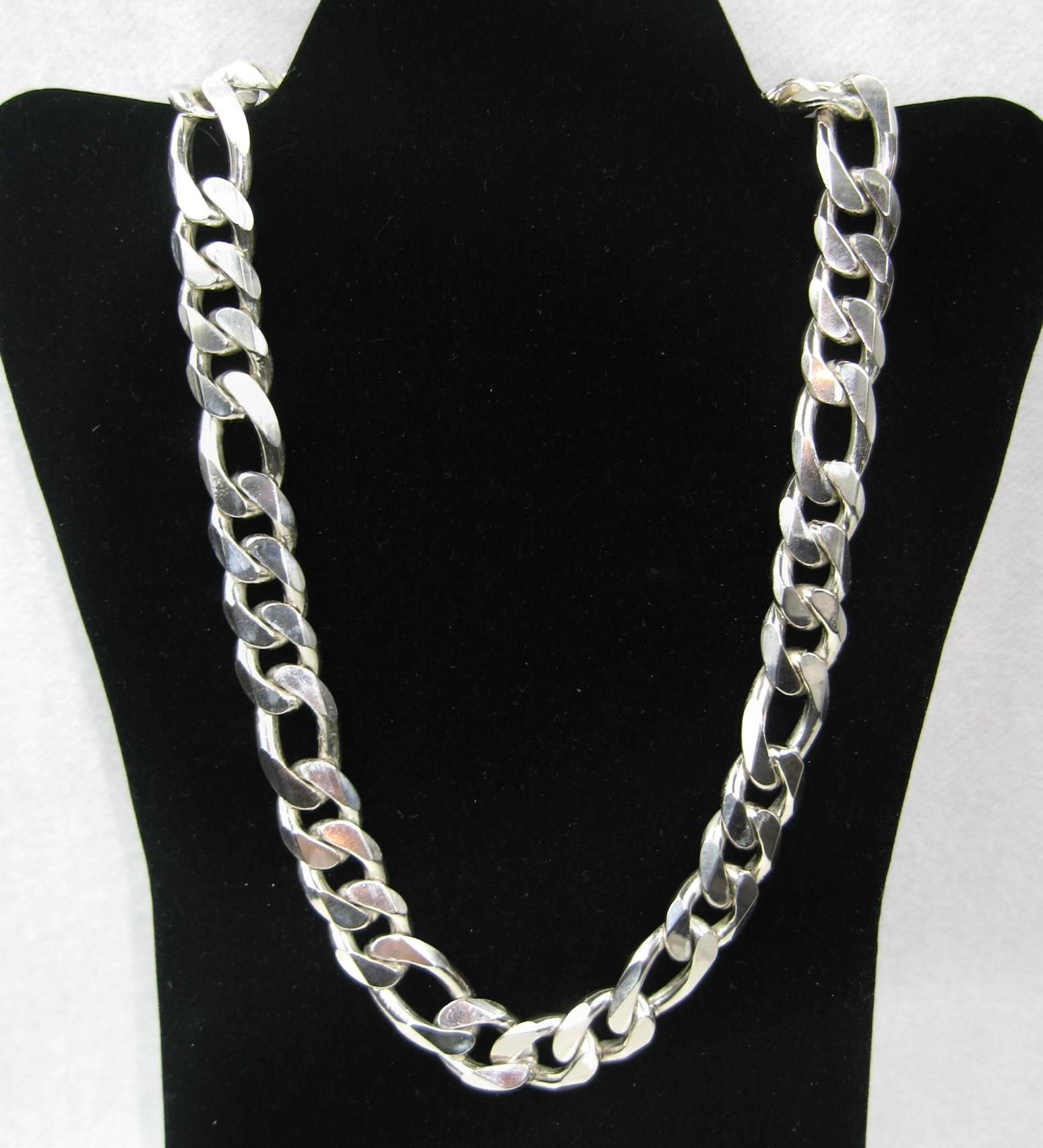 A very large Sterling silver Figaro chain Circa 1990s. Measures 24.5 end to end .69 or 17.76mm wide. This can be worn by both a man or woman. Heavy in weight. This is out of a massive collection of Contemporary Fashion as well as  Hopi, Zuni,