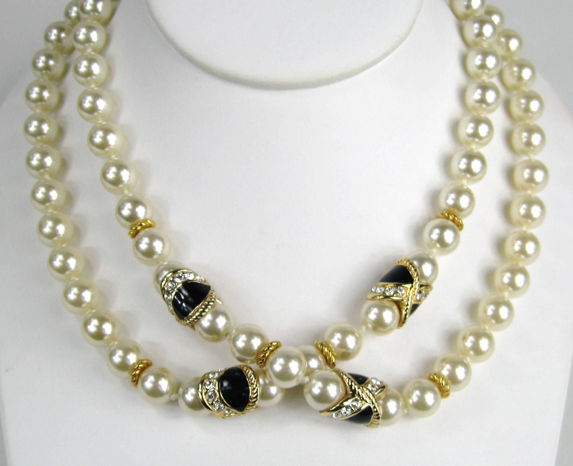 Stunning Crystal Faux Pearl necklace with black enamel. 36 inches end to end. Pearls are 9.9 mm. We have many more Ciner pieces on our storefront. This is out of our massive collection of Hopi, Zuni, Navajo, Southwestern, sterling silver, costume
