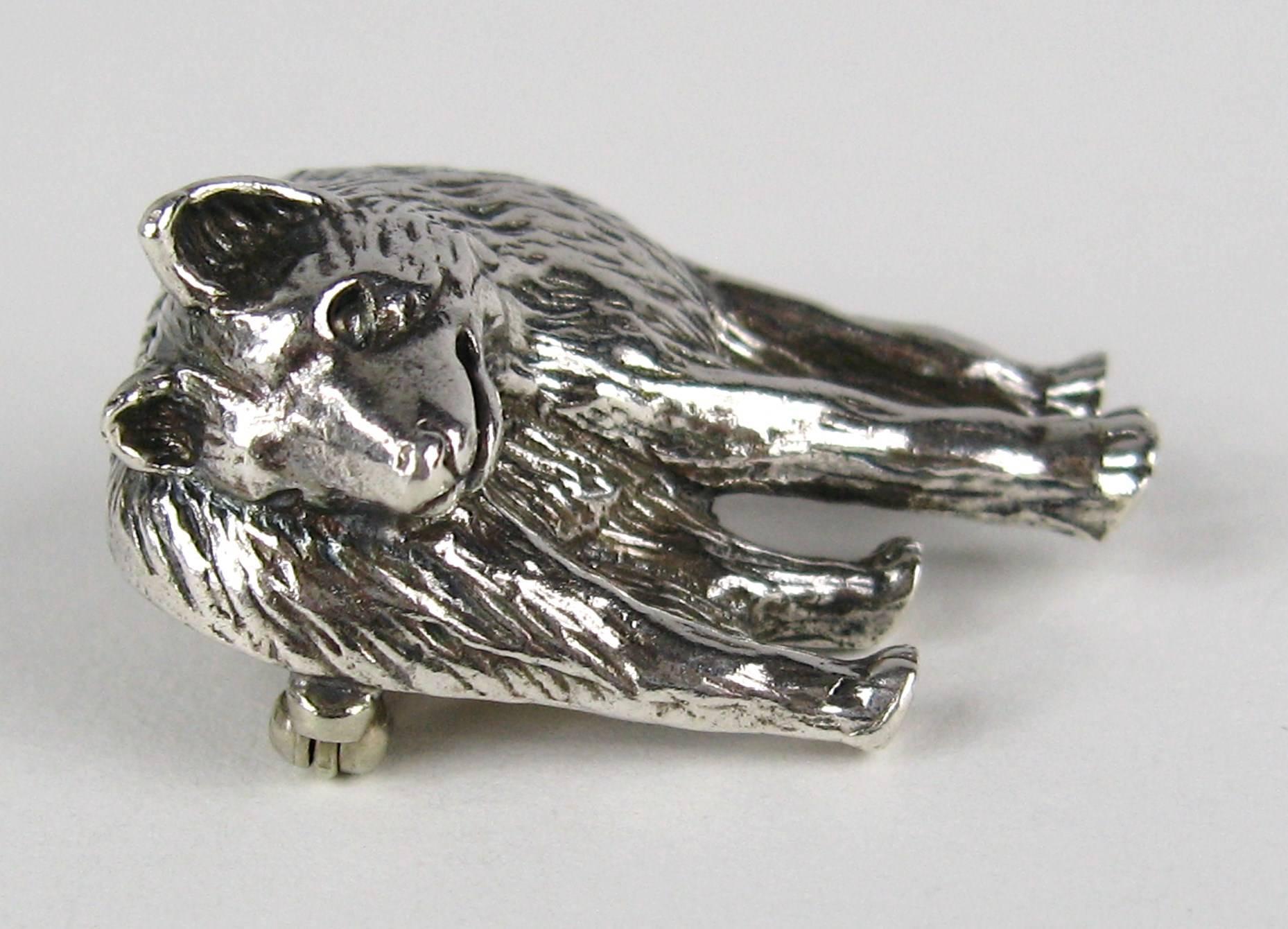 The work of New Mexico silversmith Carol Felley rarely comes along and when it does, it's a thrill because her designs are so amazing. This sterling silver Wolf brooch is stunning. 3-D Figurative Wolf staring down it's prey. Matching bracelet