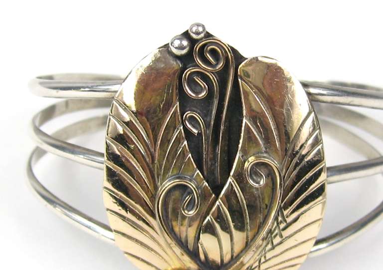 Lovely 14k Gold Handcrafted sterling silver cuff. Three band bracelet. Measures 1.83 inches top to bottom x 1.33 inches. This has give to it so you can open up to made it bigger, or smaller. This is out of a massive collection of Contemporary