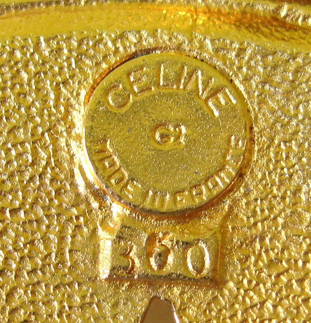 Collier Céline en or doré avec disque découpé en forme d'étoile et de lune  en vente 1