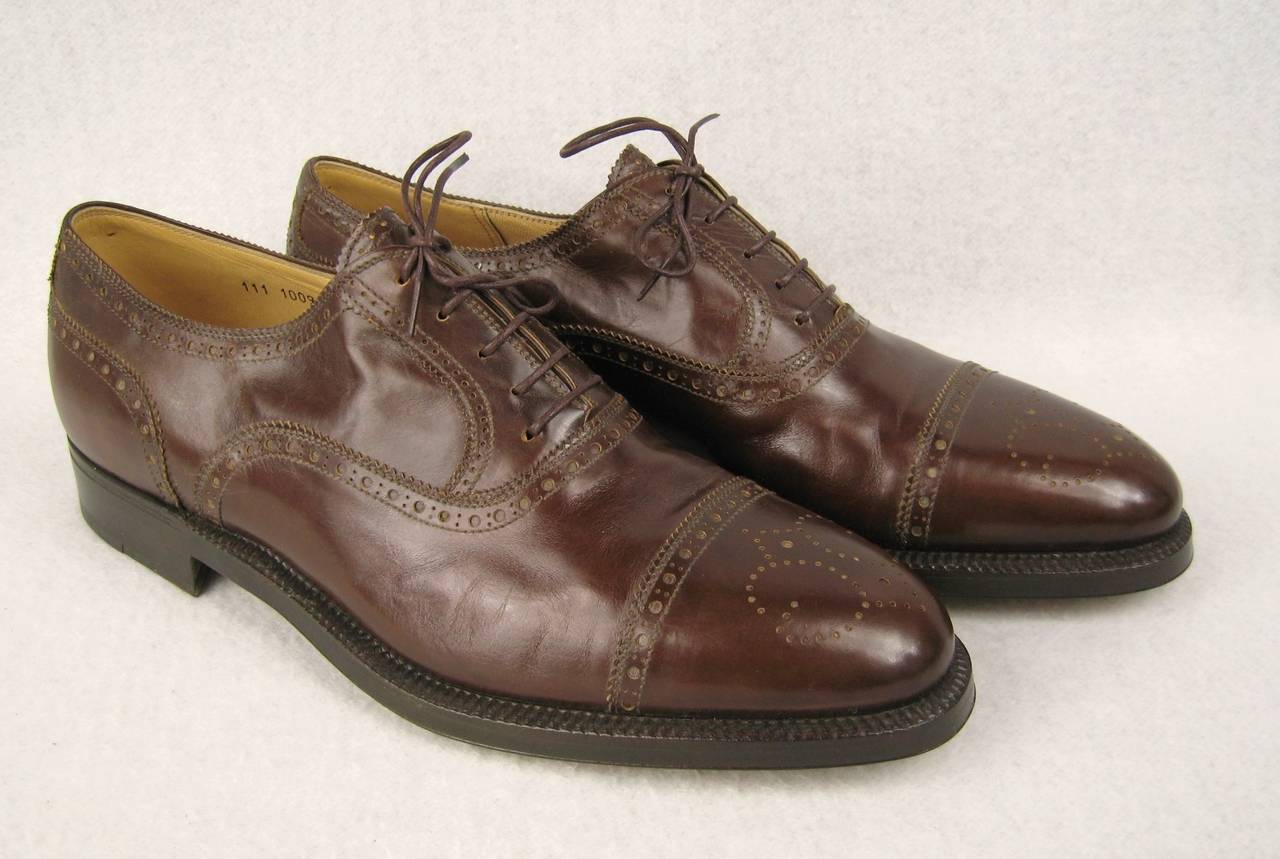 a pair of 1970s Gucci Leather Oxfords shoes never worn, Maybe they were tried on? Clean and Fabulous. Can be worn by men or woman. Size 42 Measures 4 wide x 11-5/8 toe to heel.  Be sure to check our store front for more fabulous pieces from this
