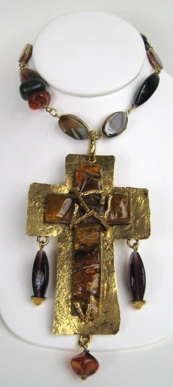 Early piece of Philippe Ferrandis Brutalist in design. Simply stunning! This makes a statement. Large Cross. Long Beaded Chain made up of natural stones and poured glass. The Cross sits on another large gold plated cross. Large chunks of glass make