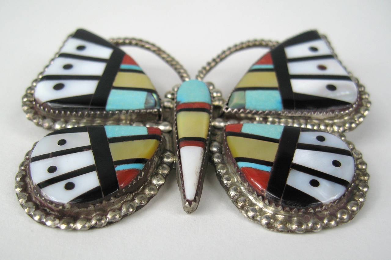 Large Native American Zuni Signed OC (Oliver Cellicion) Sterling Silver Turquoise Coral Onyx Pearl Butterfly Inlays Brooch and a Pendant. Measures 3 Inches wide 2 1/2 inches long no cracks. Hallmarked OC Zuni on the back. This is out of a massive