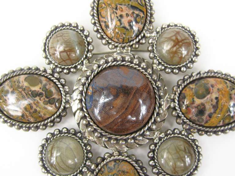 Stunning Dweck Brooch. Bezel set Jasper stones in sterling silver. Dated 1992. Hallmarked Stephen Dweck. Sterling silver. Measures 3.9 inches  H x 3.9 inches wide. This was purchased new, put away and never worn. This is out of a massive collection