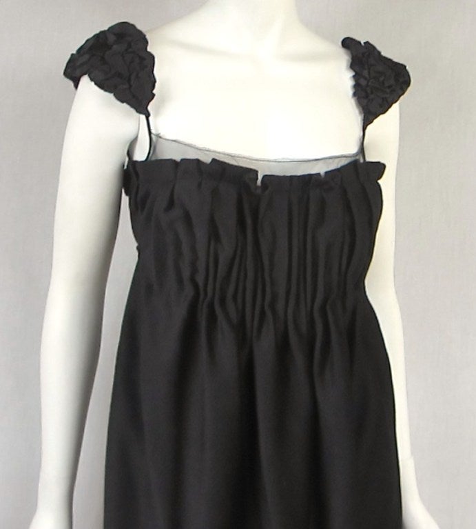 100% Cashmere Marc Jacobs Dress- Ties just below the bust- zippered back - Empire style with room in the waist - Ruched Cap Sleeves -Netted Bodice. Please be sure to check our storefront for more fashion as we have both Vintage and Contemporary