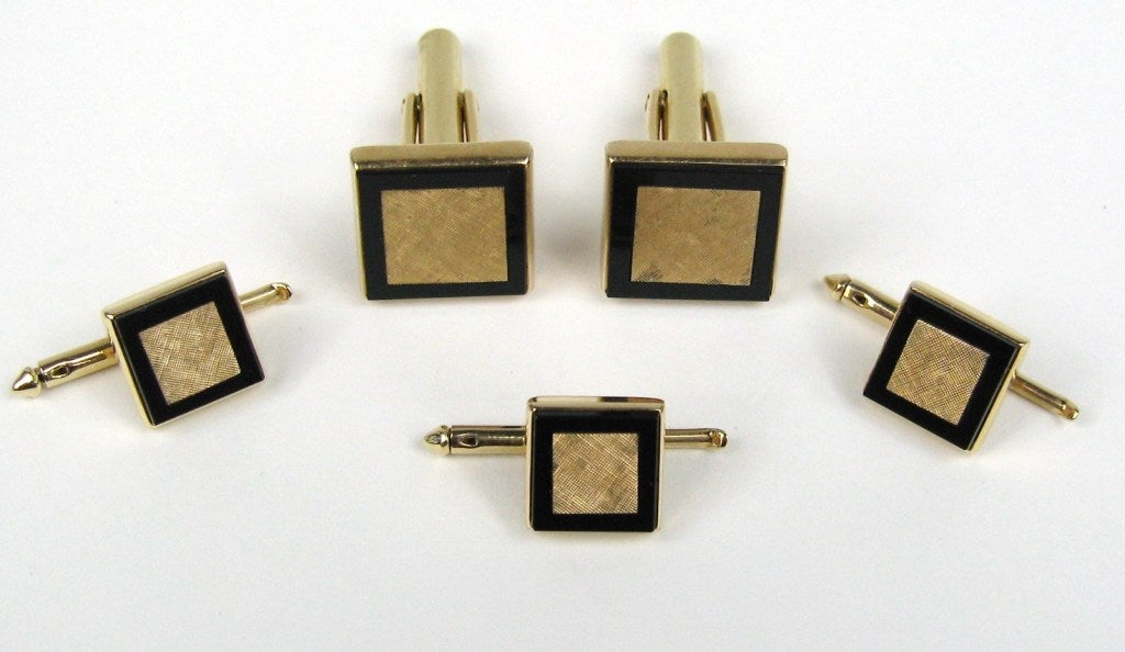 Brushed Gold Center with a black onyx surround. Handsome set of original Mid Century Cuff link- Shirt stud  Set. Included are Square Table cuff links, 3 Matching Shirt Studs .58 Square cuff-links .42 Square - on the studs. Hallmarked on the