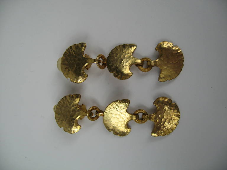 Pair of clip on Dominique Aurientris earrings, still on the original earring card from neiman marcus 
Measuring 3 in long x 1 in wide
This French jewelry designer has a vast international customer base and is known throughout the world for her