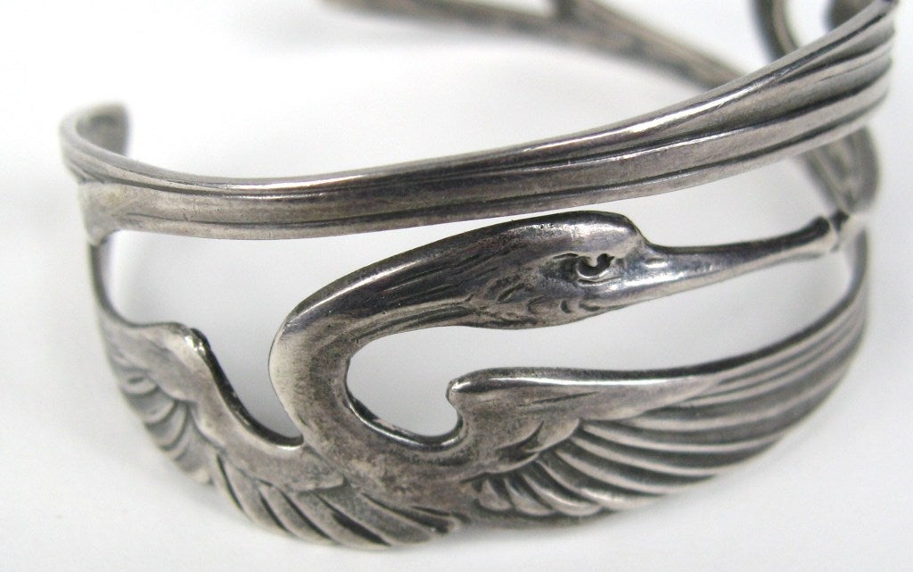 Delicate Art Nouveau Bracelet. Take a look at the two bird who meet in the middle as if they were kissing. So Romantic. Measuring 1 inch  wide with a opening of 1.30 inches will fit a 7 inch wrist easily. This is out of a massive collection of Hopi,