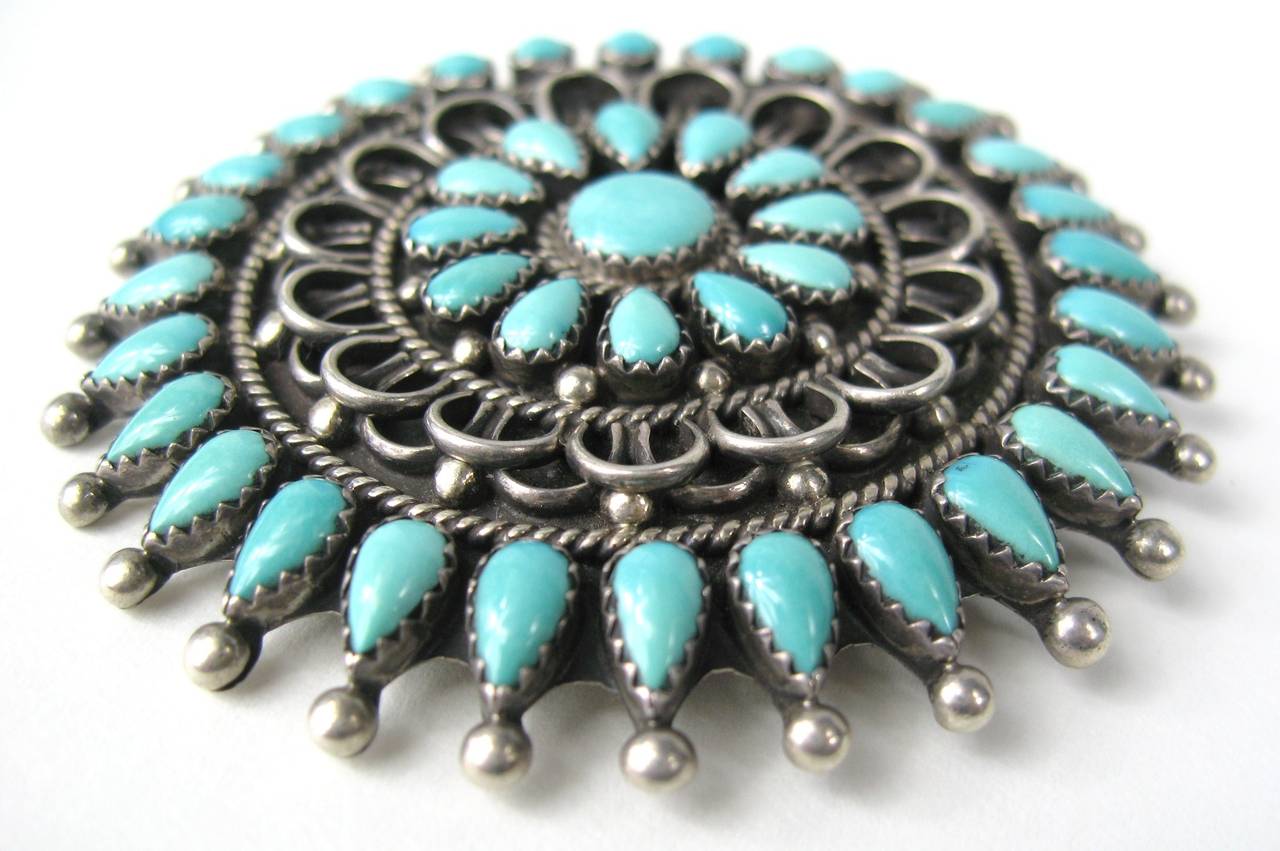 VERY large, vintage Zuni sterling silver, petit point turquoise pin Hallmarked YR Charley. Measuring 2.62 in diameter. More stunning pieces on our storefront.  This is out of a massive collection of Hopi, Zuni, Navajo, Southwestern, sterling silver,